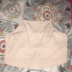 A light pink crop top.